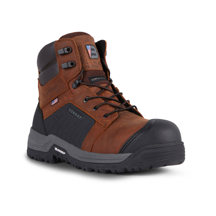 Brown and black work boot on a white background