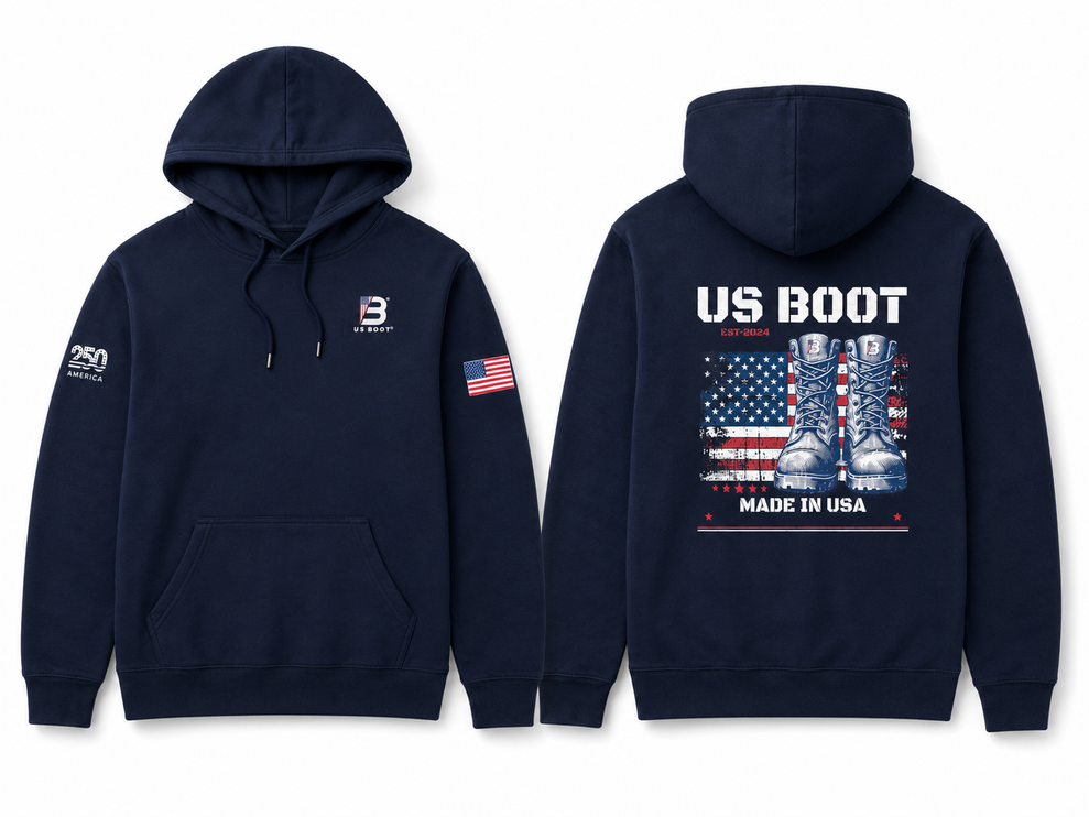 Front and back views of a navy blue pullover hoodie. The front features a kangaroo pocket, a drawstring hood, a small white logo on the left chest, and a small American flag patch on the right sleeve.