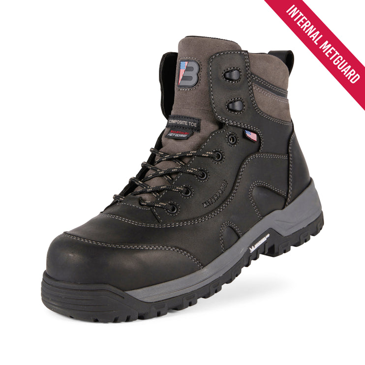 A dark gray and black safety work boot with a lace-up front, protective toe, and a red diagonal banner overlay that reads 'INTERNAL METGUARD'.