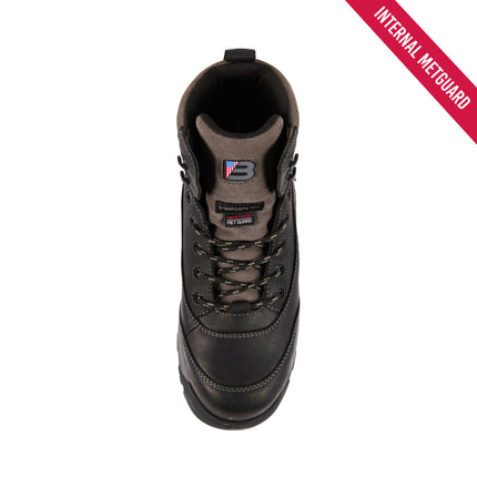 A single black high-top work boot shown from a top-down view on a white background, with a red diagonal banner in the top-right corner reading 'INTERNAL METGUARD'. The boot has black laces, a black sole, and a brownish-gray collar lining with a small logo patch.