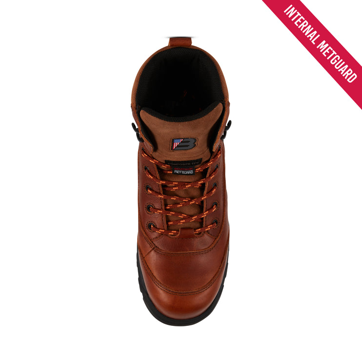 A brown leather safety boot shown from a top-down view on a white background, featuring orange-brown laces and a black sole. A red diagonal banner in the top right corner reads 'INTERNAL METGUARD'.
