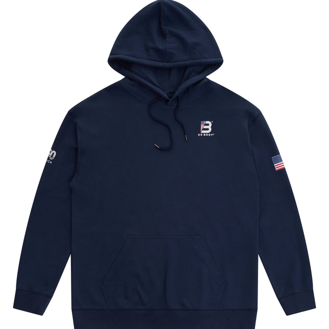 A navy blue pullover hoodie with a kangaroo pocket, featuring a small white and red logo on the left chest, a white graphic on the right sleeve, and a small American flag patch on the left sleeve, shown against a plain white background.